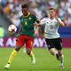 Adolphe Teikeu of Cameroon and Timo Werner of Germany battle for possession during the FIFA Confederations Cup Russia 2017 Group B match between Germany and Cameroon at Fisht Olympic Stadium on June 25, 2017, in Sochi, Russia.
